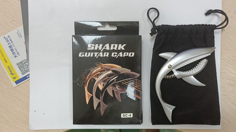 Generic Shark Capo Acoustic Classical Guitar ClampMatte silver color box packaging with flannel bag Matte silver color box packaging with flannel bag 