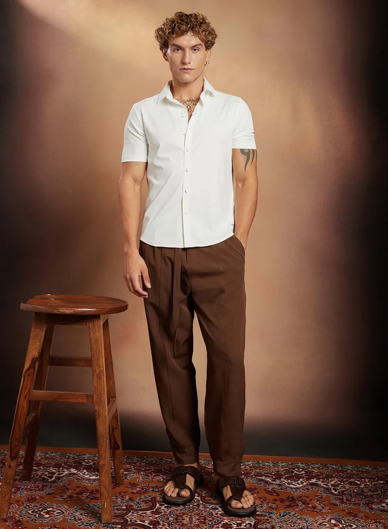 Campus Sutra Campus Sutra Men's Chalk White Seamless Solid Shirt For Casual Wear | Spread Collar | Short Regular Sleeves | Button Closure | Shirt Crafted With Comfort Fit For Everyday Wear