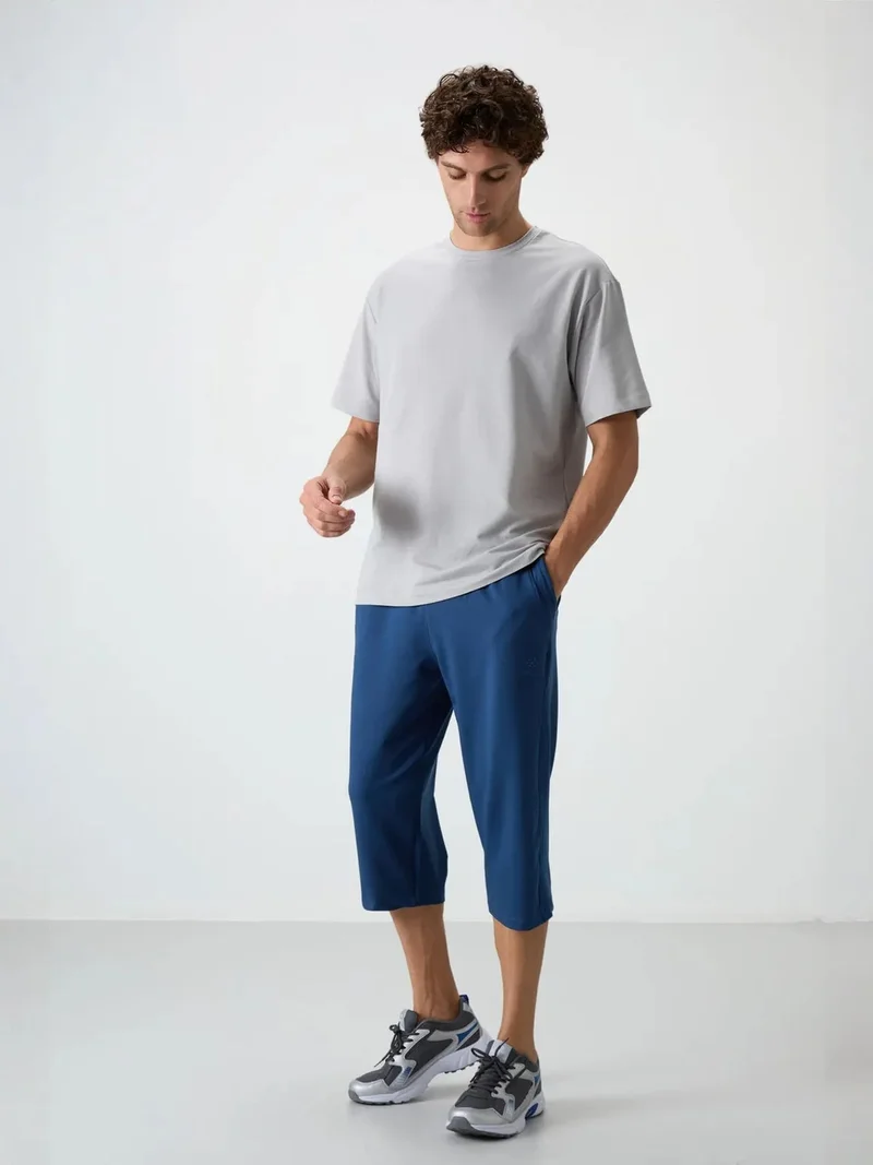 تومي لايف TOMMY Men's Mid-waist Wide-leg Capri Shorts