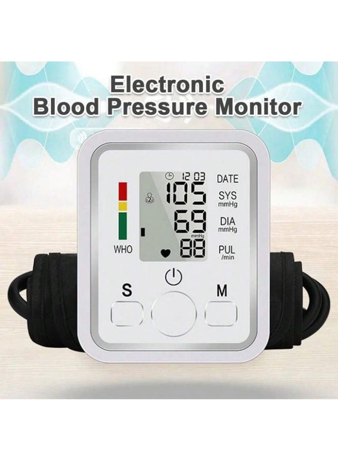 This electronic arm blood pressure monitor features microcomputer technology, a large LCD screen for accurate readings, internal memory for storing results and level alerts, and is battery and USB powered for easy and safe home use. - Image 2