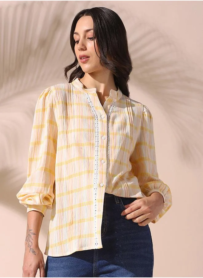 Dennis Lingo Women yellow regular fit checkered full sleeves t-shirt viscose top with button closure featuring a mandarin collar- your next go-to for effortless flair.