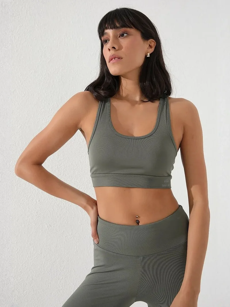 تومي لايف TOMMY Sleeveless Cropped Fitted Sports Top
