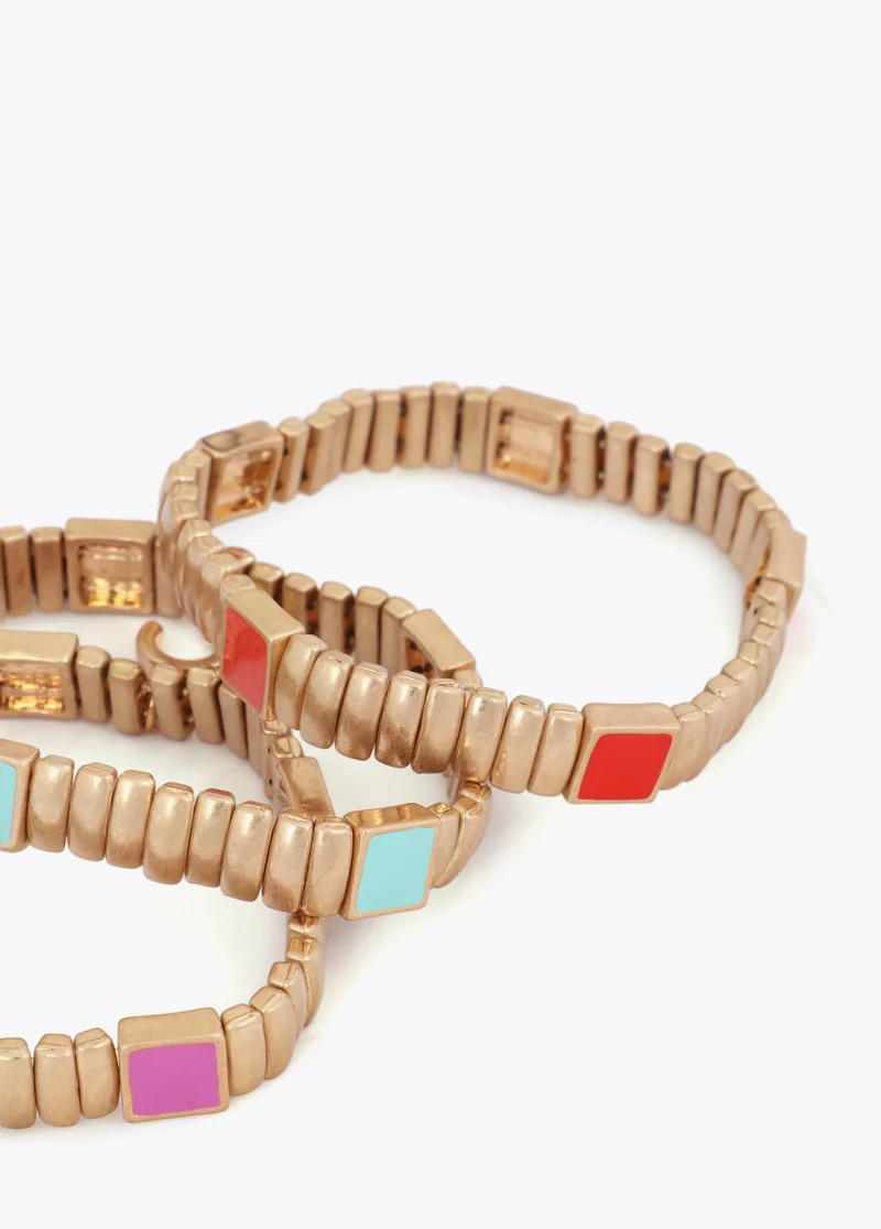 لولا كساديمونت Set of Metallic Elastic Bracelets with Colorful Details