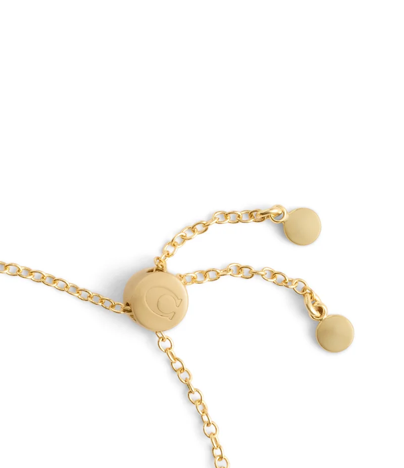 كوتش Signature Pavé Heart Slider Bracelet