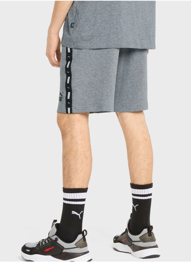 PUMA - 9" Essential Tape Shorts - Image 1