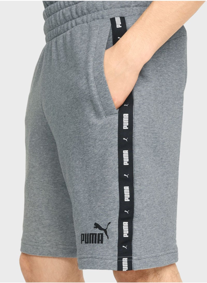 PUMA - 9" Essential Tape Shorts - Image 1