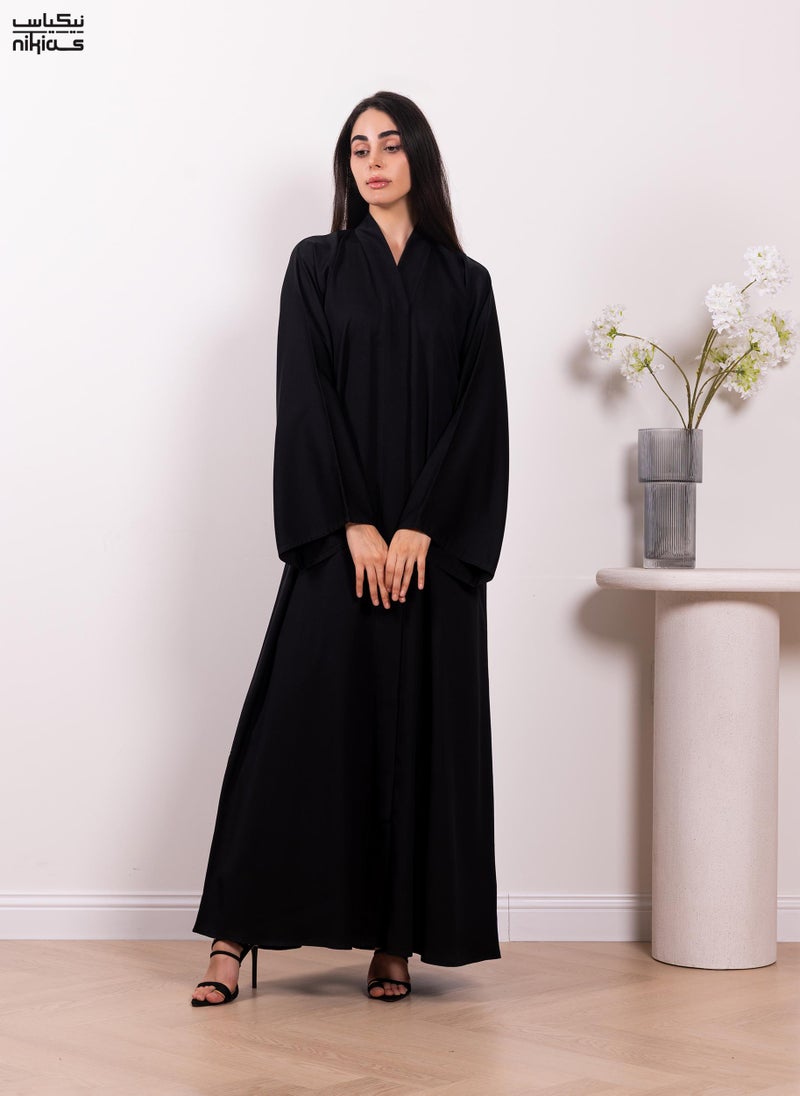 Nikias Classic Nida fabric abaya featuring a front band and full button closure - Image 1