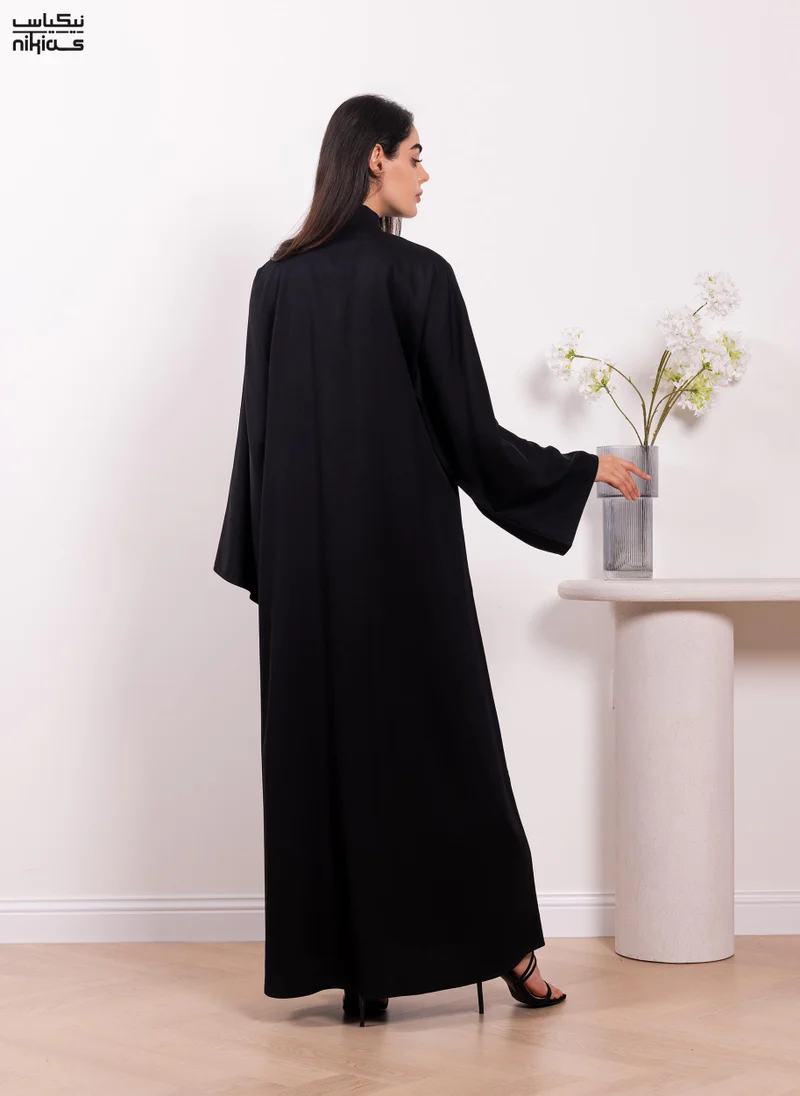 Nikias  Nikias Classic Nida fabric abaya featuring a front band and full button closure for Women | Best Price UAE