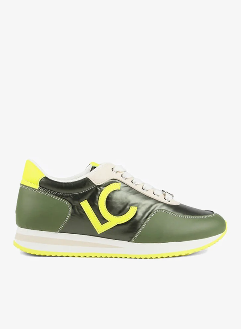Lola Casademunt Green and lime sneakers