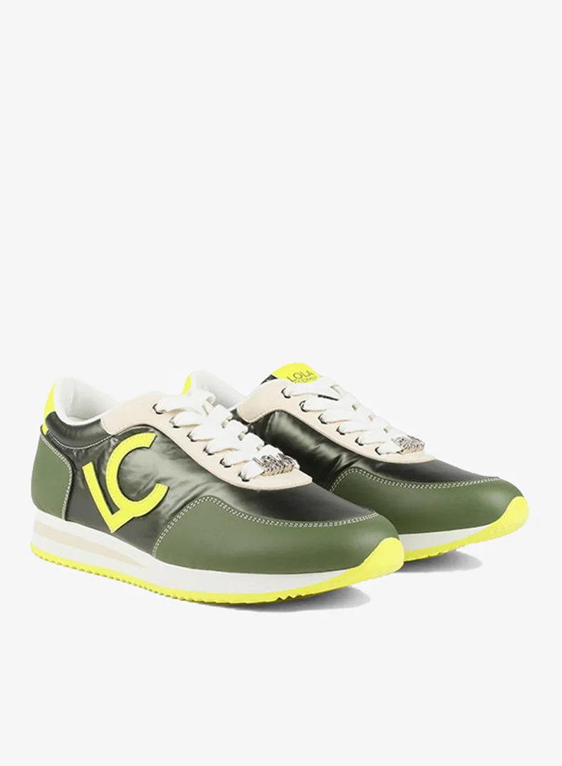 Lola Casademunt Green and lime sneakers