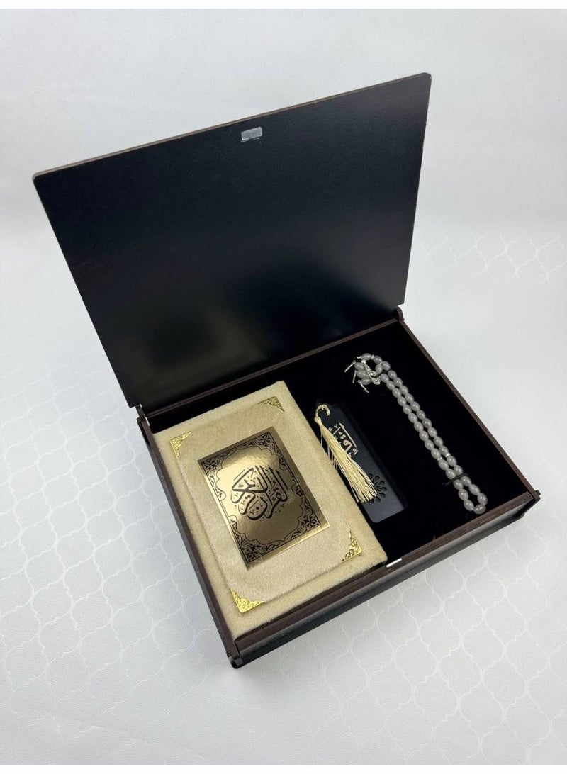 Samrix Quran Box  A luxurious box containing a Quran, bookmark, reading stand, and prayer beads.  ✔ Luxurious Quran box with an elegant wooden design ✔ Includes a high-quality gift Quran ✔ Includes a bookmark for easy reading ✔ Equipped with a reading stand ✔ Includes a distinctive prayer beads ✔ Suitable for elegant gifts and giveaways ✔ Practical yet elegant design ✔ A special gift for friends and family ✔ Ideal for formal and religious occasions ✔ Luxurious packaging, ready for presentation ✔ Suitable for the office or living room ✔ Can be customized upon request ✔ High-quality materials for durability ✔ A design that combines luxury and spirituality ✔ Adds a practical and artistic touch to any space ✔ Ideal as an elegant giveaway for events ✔ Reflects attention to detail and quality ✔ A practical, luxurious, and spiritually meaningful gift - Image 1