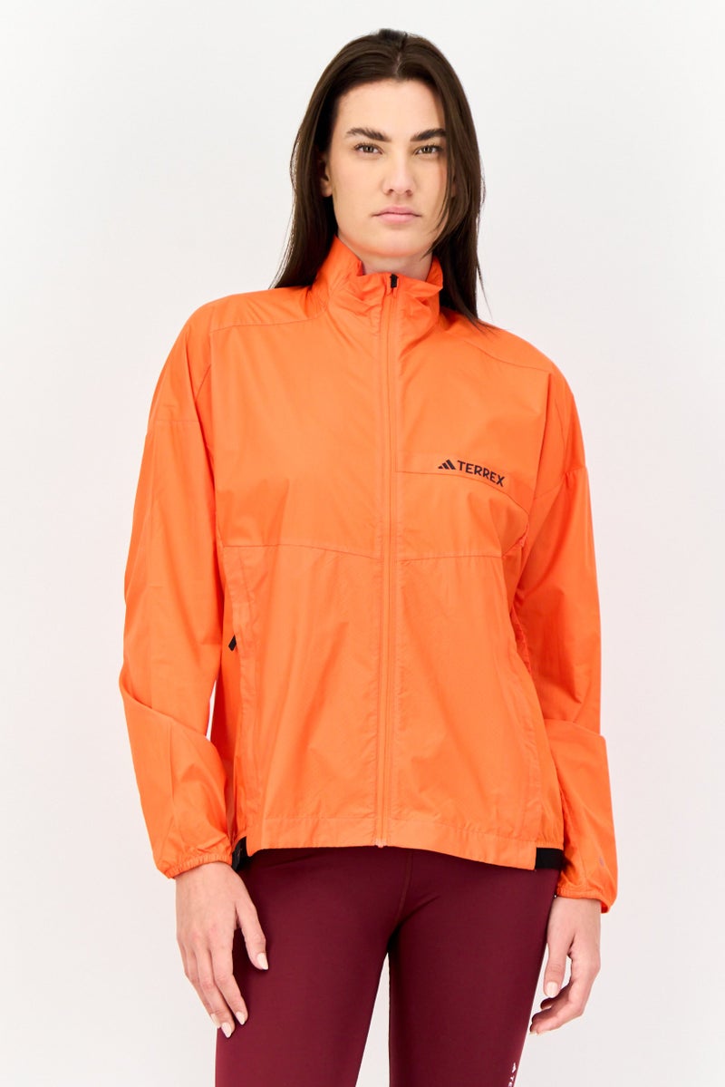 Adidas جاكيت رياضي نسائي بأكمام طويلة مناسب للجري، برتقالي - Image 1