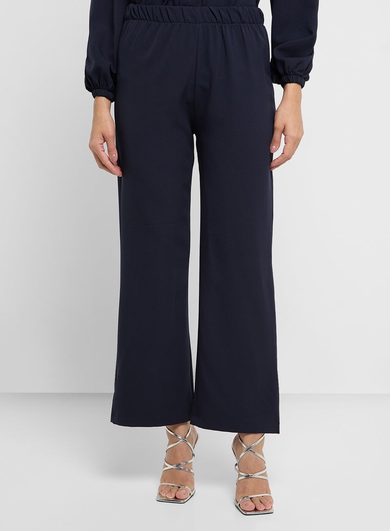 خزانة طقم بلوزة وبنطلون بحزام - Image 4