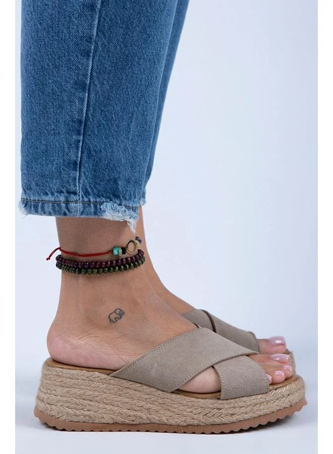 Tegan Women's Genuine Leather Double-Band Cross Sandal in Beige Suede.