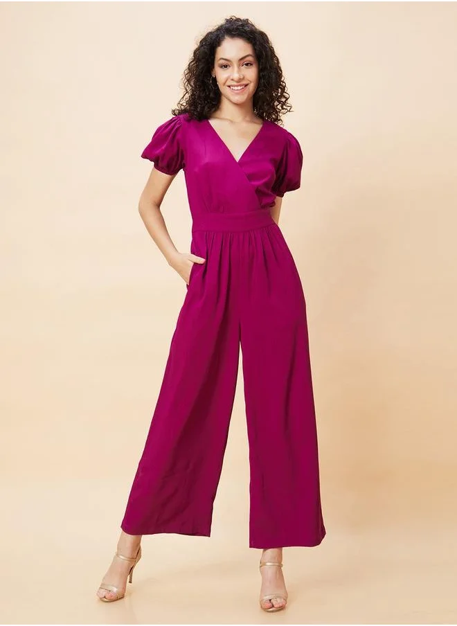جلو باص Globus Women Wine Solid Wrap V-Neck Short Sleeves Jumpsuit with Waist Tie-Up by Styli