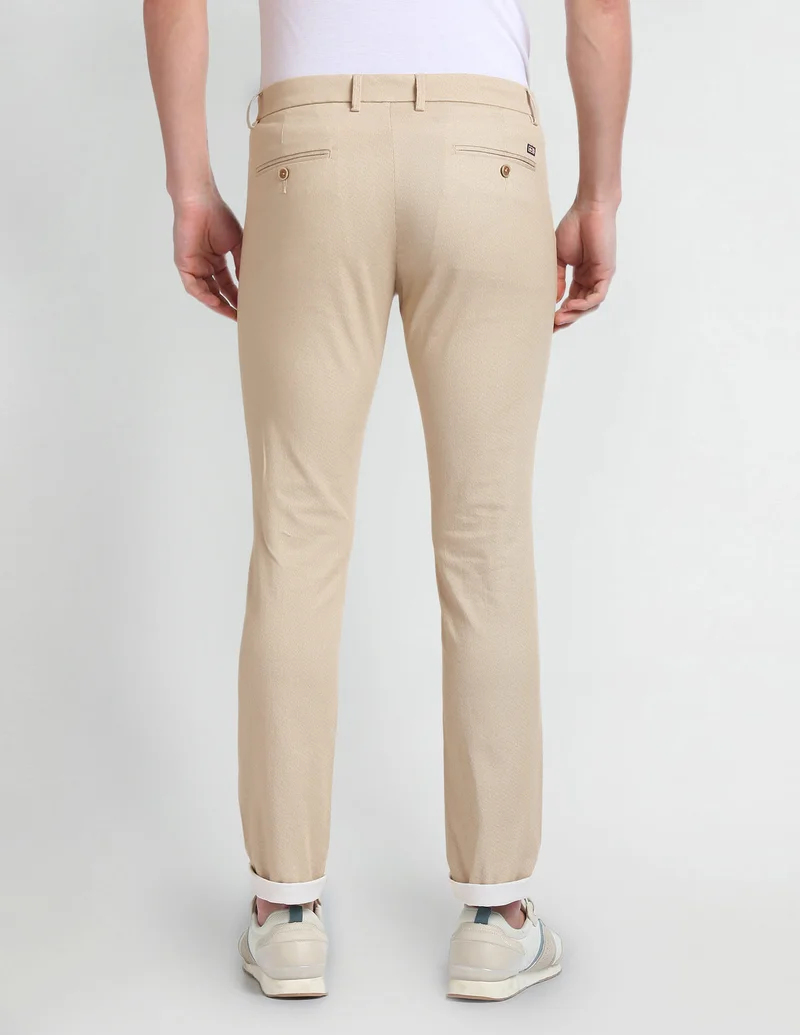 Arrow Beige Low Rise Smart Flex Trousers for Men | Best Price UAE