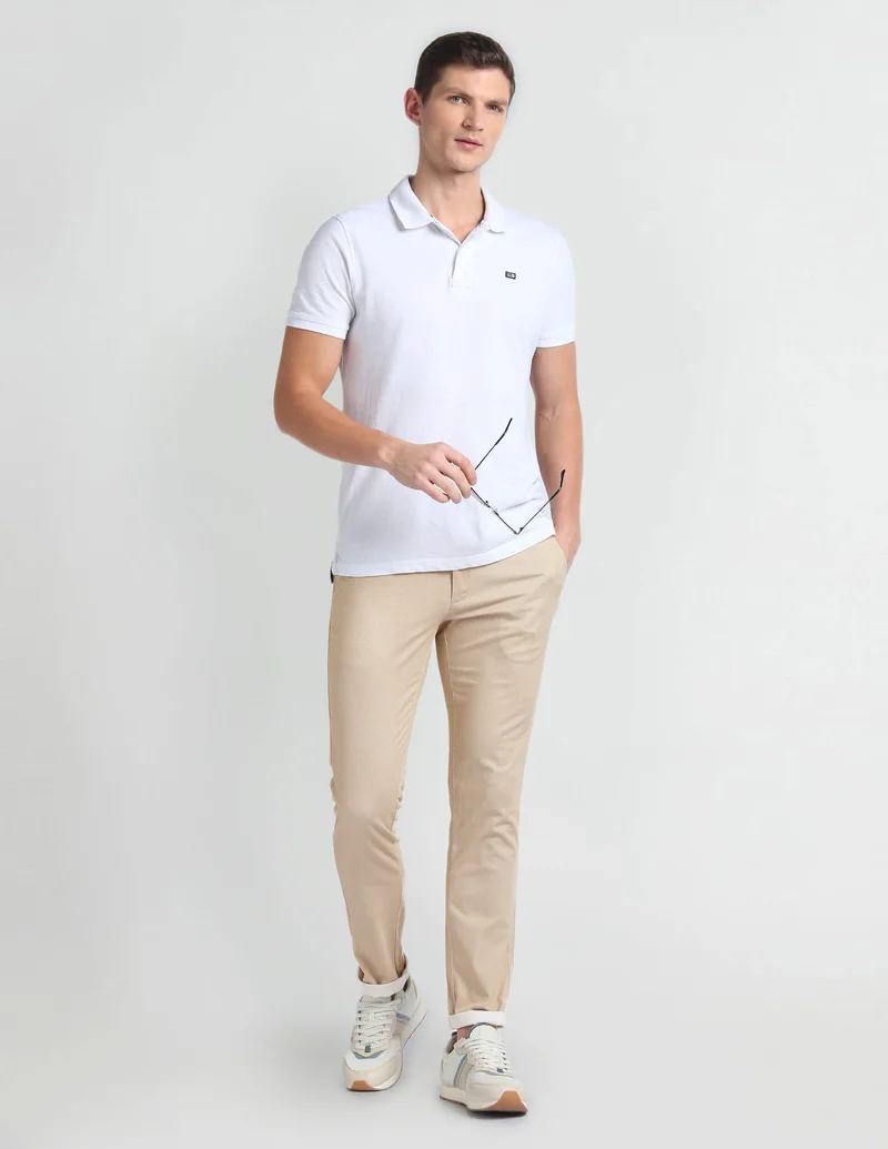 Arrow Beige Low Rise Smart Flex Trousers for Men | Best Price UAE