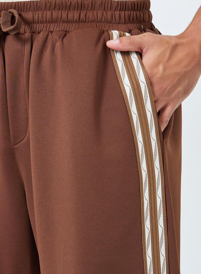Styli Men Oversized Taped Open Hem Joggers - Image 4