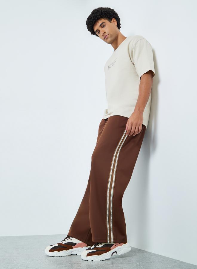 Styli Men Oversized Taped Open Hem Joggers - Image 2