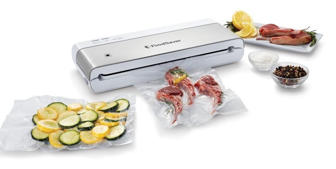 COMPACT VACUUM SEALER MACHINE WITH AIRTIGHT BAGS AND ROLL IDEAL FOR SOUS VIDE AND AIRTIGHT FOOD STORAGE WHITE