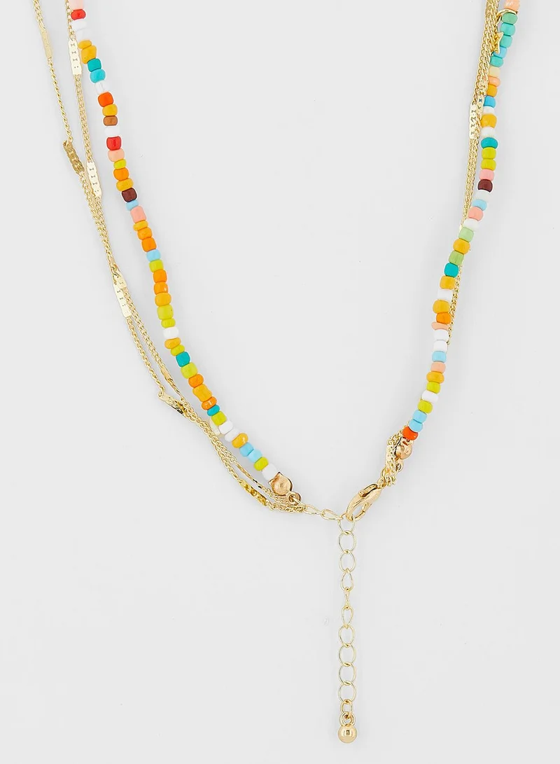 Ginger Layered Beaded Star Pendant Necklace
