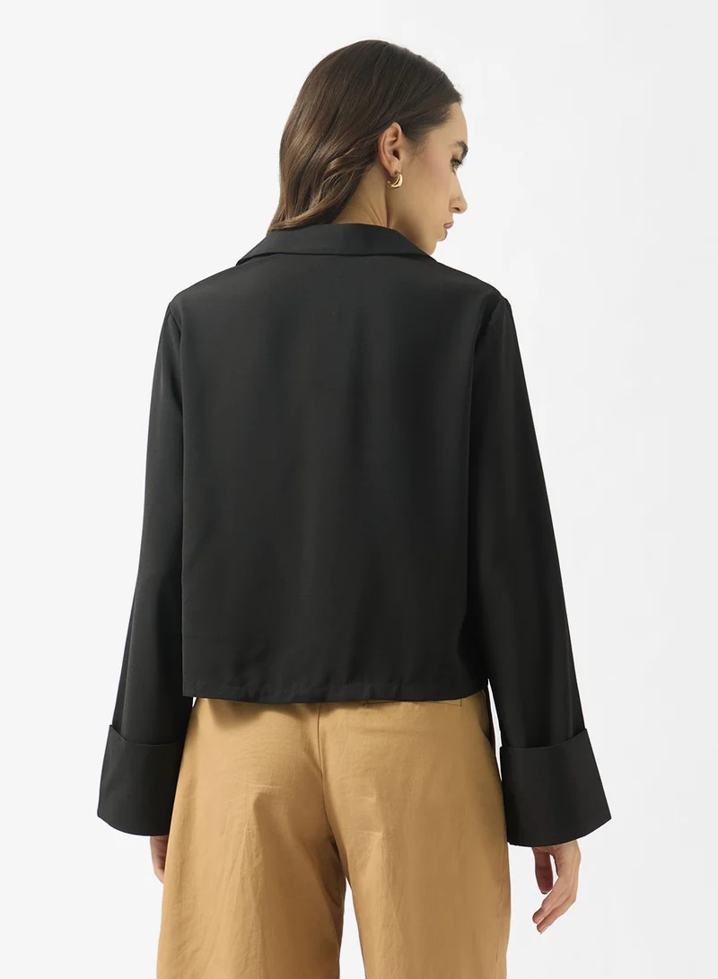 جينجر قميص بقصة مريحة وتفاصيل ربط