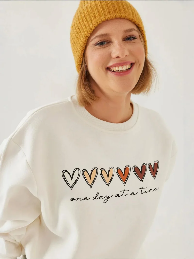 بيانكو لوتشي بلوفر لوكسي بياقة دائرية بنقشة قلب