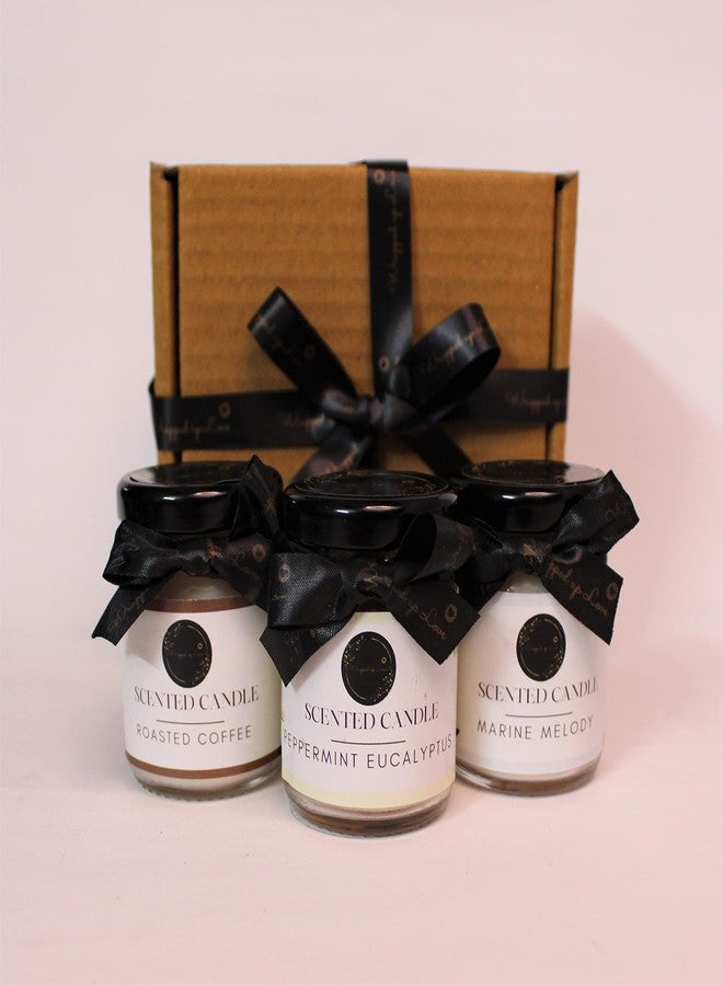 Wrapped up Love مجموعة شموع معطرة صغيرة من Wrapped up Love (بروائح Marine Melody، والقهوة المحمصة، والنعناع والأوكالبتوس) - عبوة من 3 قطع - Image 1