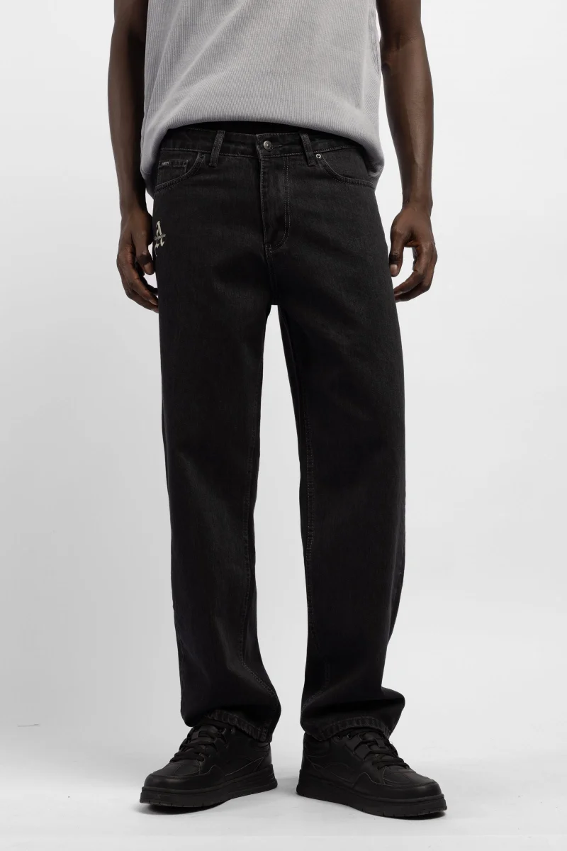 كاتش بنطلون جينز فضفاض مطبوع من كاتش ستوديو