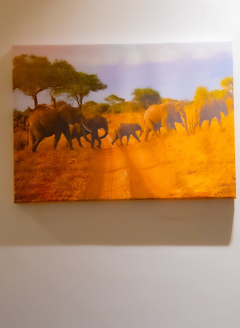 Elephants crossing the Savannah Canvas Wall Frame - Image 1