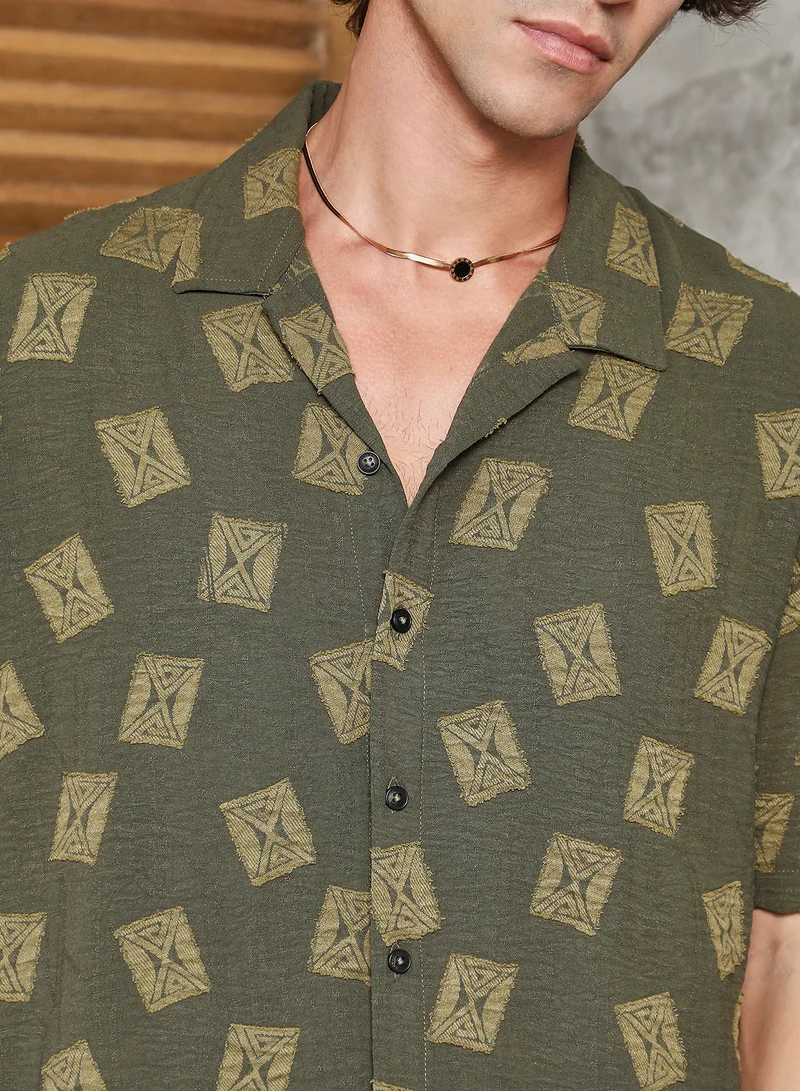 Campus Sutra Campus Sutra Men's Olive Green Indie-Cuban Oversized Shirt For Casual Wear | Cuban Collar | Short Regular Sleeves | Button Closure | Oversized Shirt Crafted With Comfort Fit For Everyday Wear