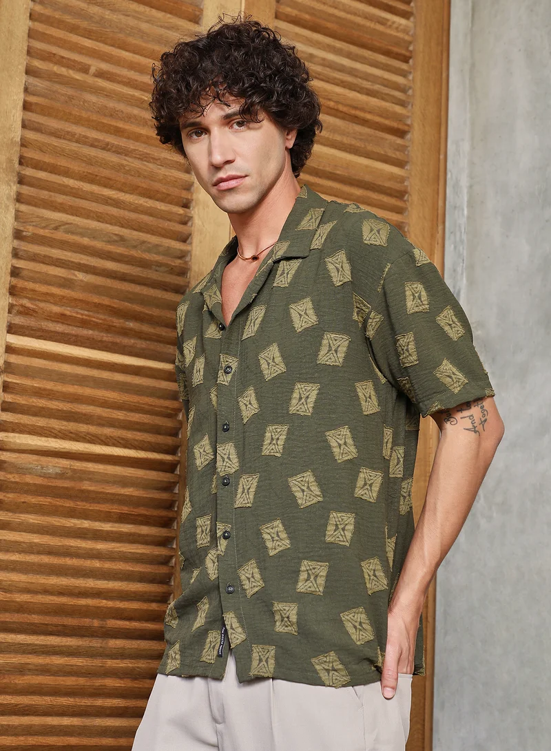 Campus Sutra Campus Sutra Men's Olive Green Indie-Cuban Oversized Shirt For Casual Wear | Cuban Collar | Short Regular Sleeves | Button Closure | Oversized Shirt Crafted With Comfort Fit For Everyday Wear