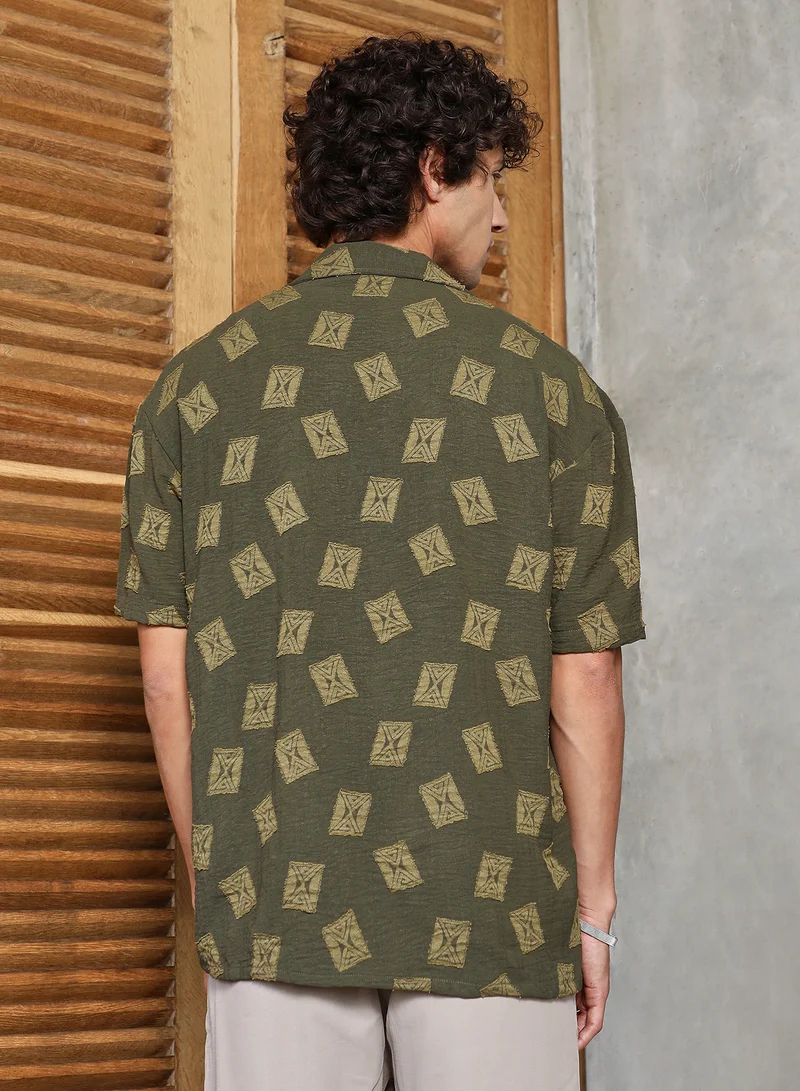 Campus Sutra Campus Sutra Men's Olive Green Indie-Cuban Oversized Shirt For Casual Wear | Cuban Collar | Short Regular Sleeves | Button Closure | Oversized Shirt Crafted With Comfort Fit For Everyday Wear