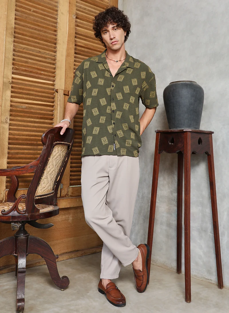 Campus Sutra Campus Sutra Men's Olive Green Indie-Cuban Oversized Shirt For Casual Wear | Cuban Collar | Short Regular Sleeves | Button Closure | Oversized Shirt Crafted With Comfort Fit For Everyday Wear