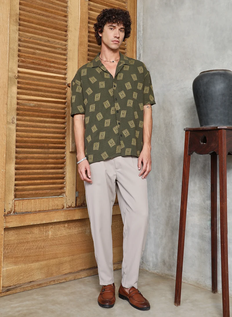 Campus Sutra Campus Sutra Men's Olive Green Indie-Cuban Oversized Shirt For Casual Wear | Cuban Collar | Short Regular Sleeves | Button Closure | Oversized Shirt Crafted With Comfort Fit For Everyday Wear