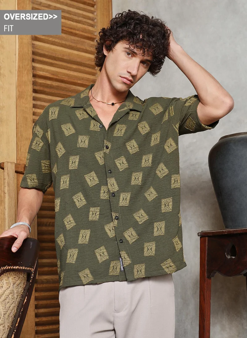Campus Sutra Campus Sutra Men's Olive Green Indie-Cuban Oversized Shirt For Casual Wear | Cuban Collar | Short Regular Sleeves | Button Closure | Oversized Shirt Crafted With Comfort Fit For Everyday Wear