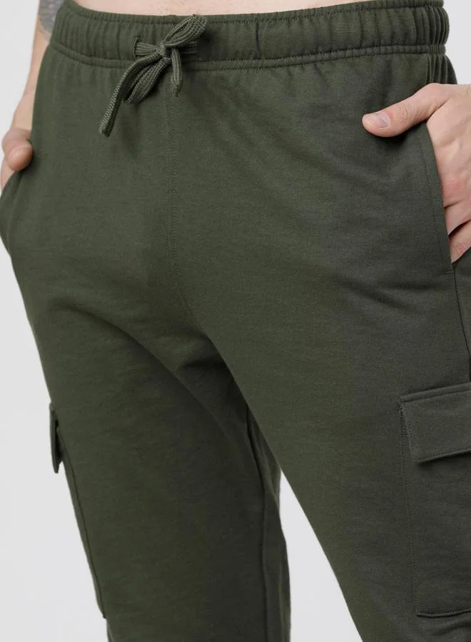 HIGHLANDER Solid Slim Fit Track Pants by Styli