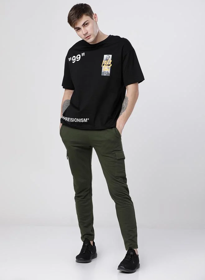HIGHLANDER Solid Slim Fit Track Pants by Styli