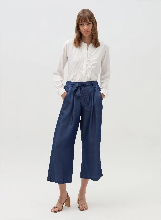 او في اس Denim-effect fluid trousers with belt
