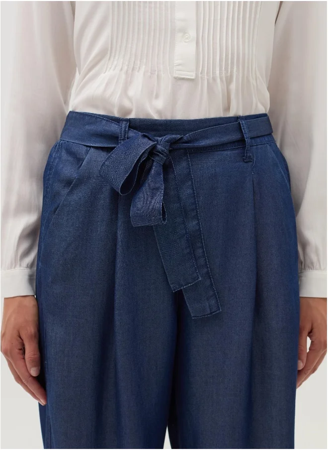 او في اس Denim-effect fluid trousers with belt