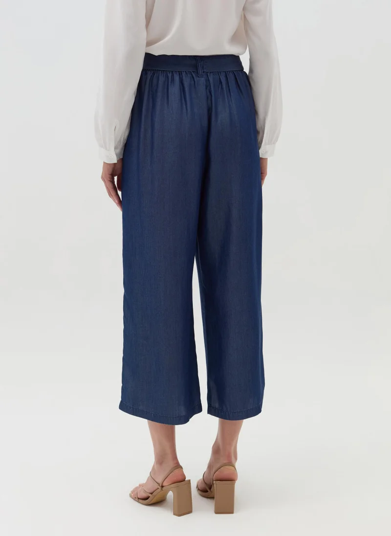 او في اس Denim-effect fluid trousers with belt