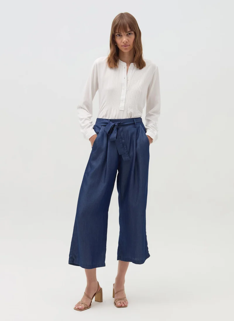 او في اس Denim-effect fluid trousers with belt