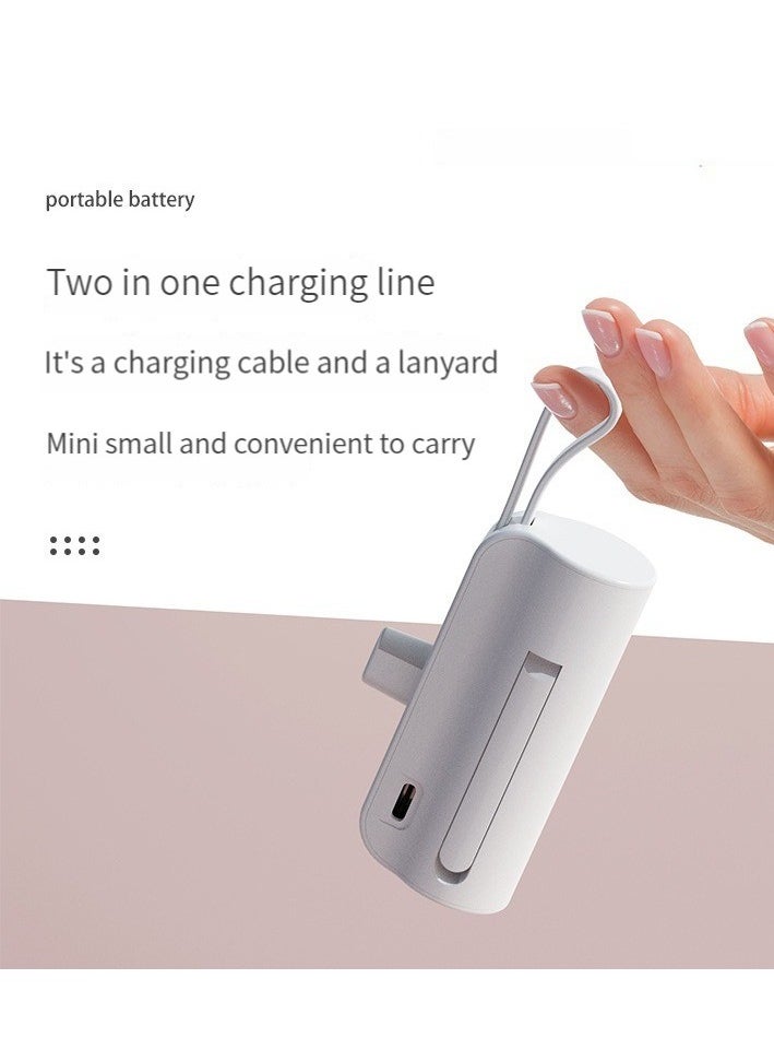 10000 mAh large capacity capsule power bank Typec plug and Apple cable dual plug with built-in mobile phone holder portable multi-functional power bank black
