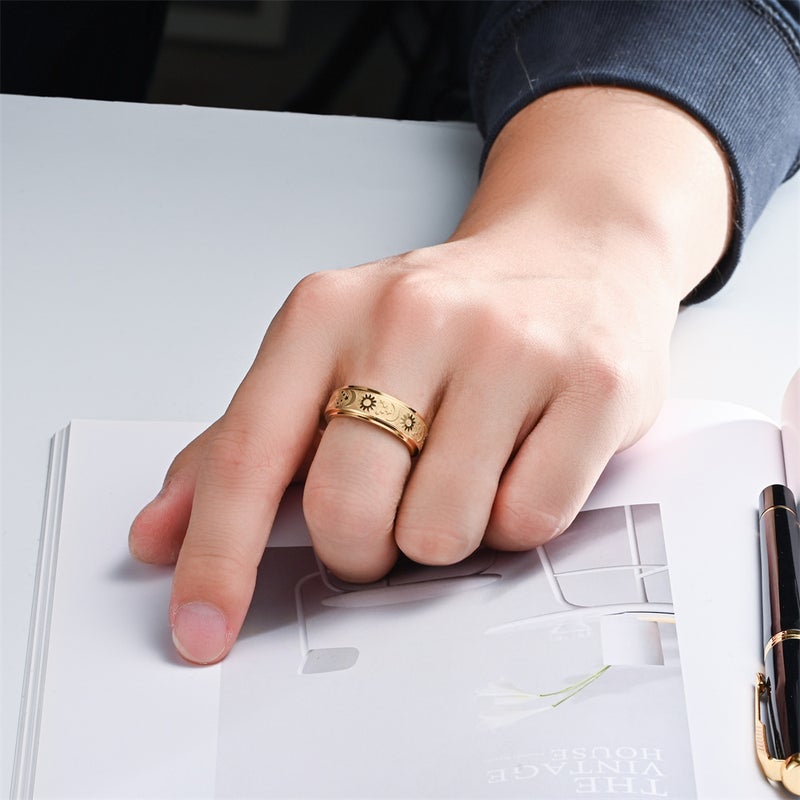Rotating Stress Relief Ring with Star, Moon, and Sun Design - Stainless Steel Fashion Accessory - Image 2