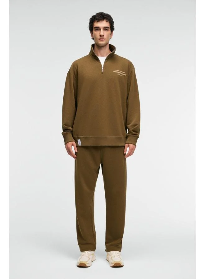 GRIMELANGE CLARENCE Men's 100% cotton corded elastic waist back pocket decorative label khaki tracksuit bottom.