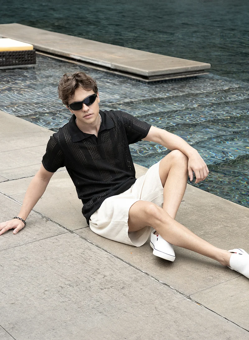 Campus Sutra Men's Onyx Black Chevron-Lined Textured Polo T-Shirt