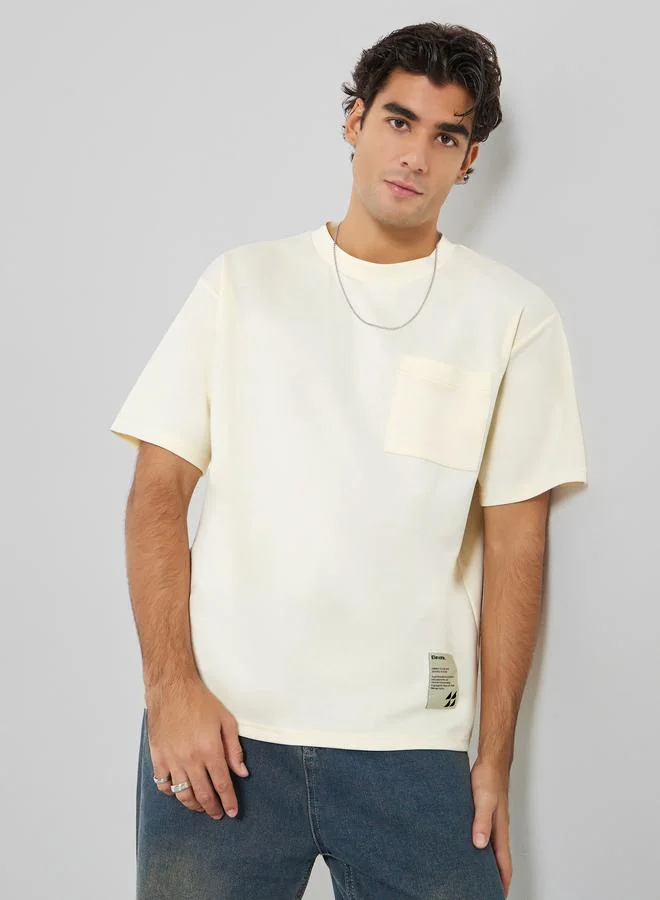 Styli Men Oversized Compact Stretch Heavy Jersey T-Shirt with Badge