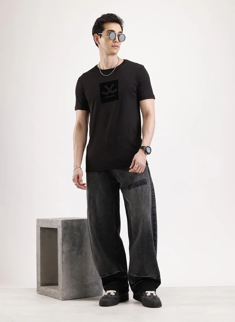 روجن Solid Flock Printed T-Shirt   |  Black