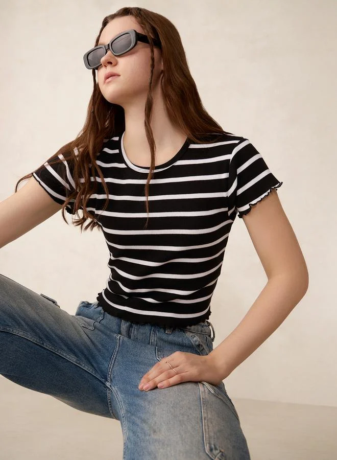 أوجيدر تيشيرت بتفاصيل مضلعة ومخططة