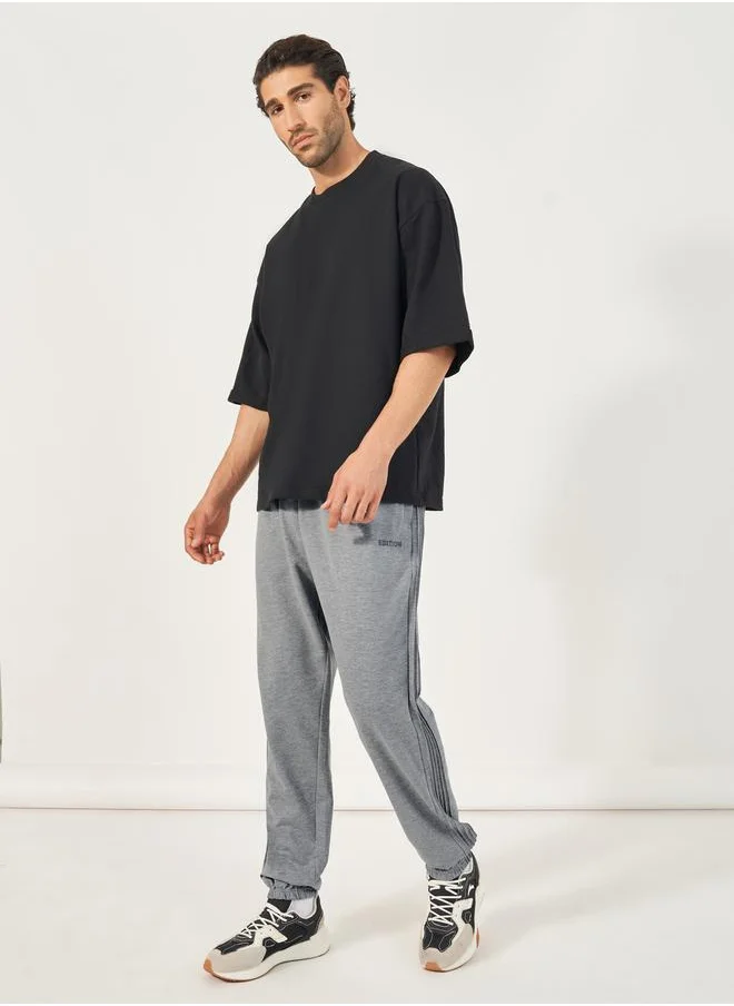 Styli Side Pintucks Oversized Joggers with Embroidered Detail